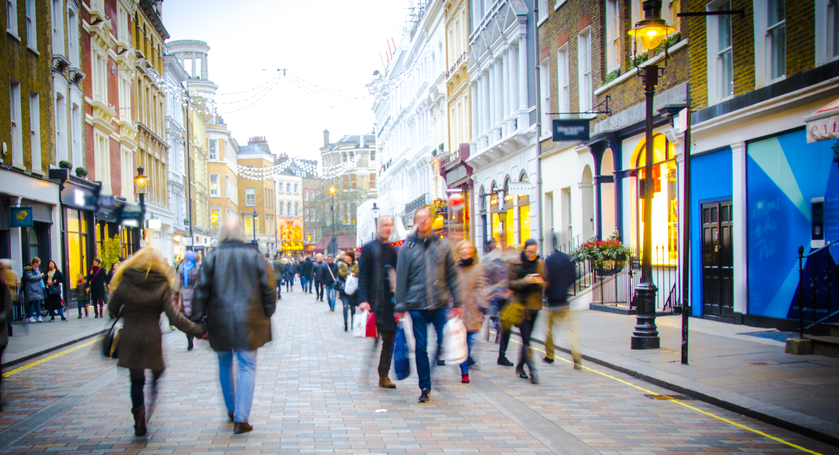 People walking down a busy street
