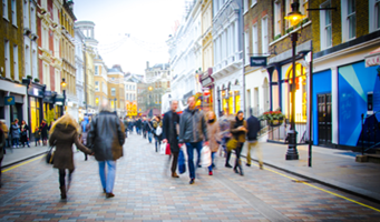 People walking down a busy street