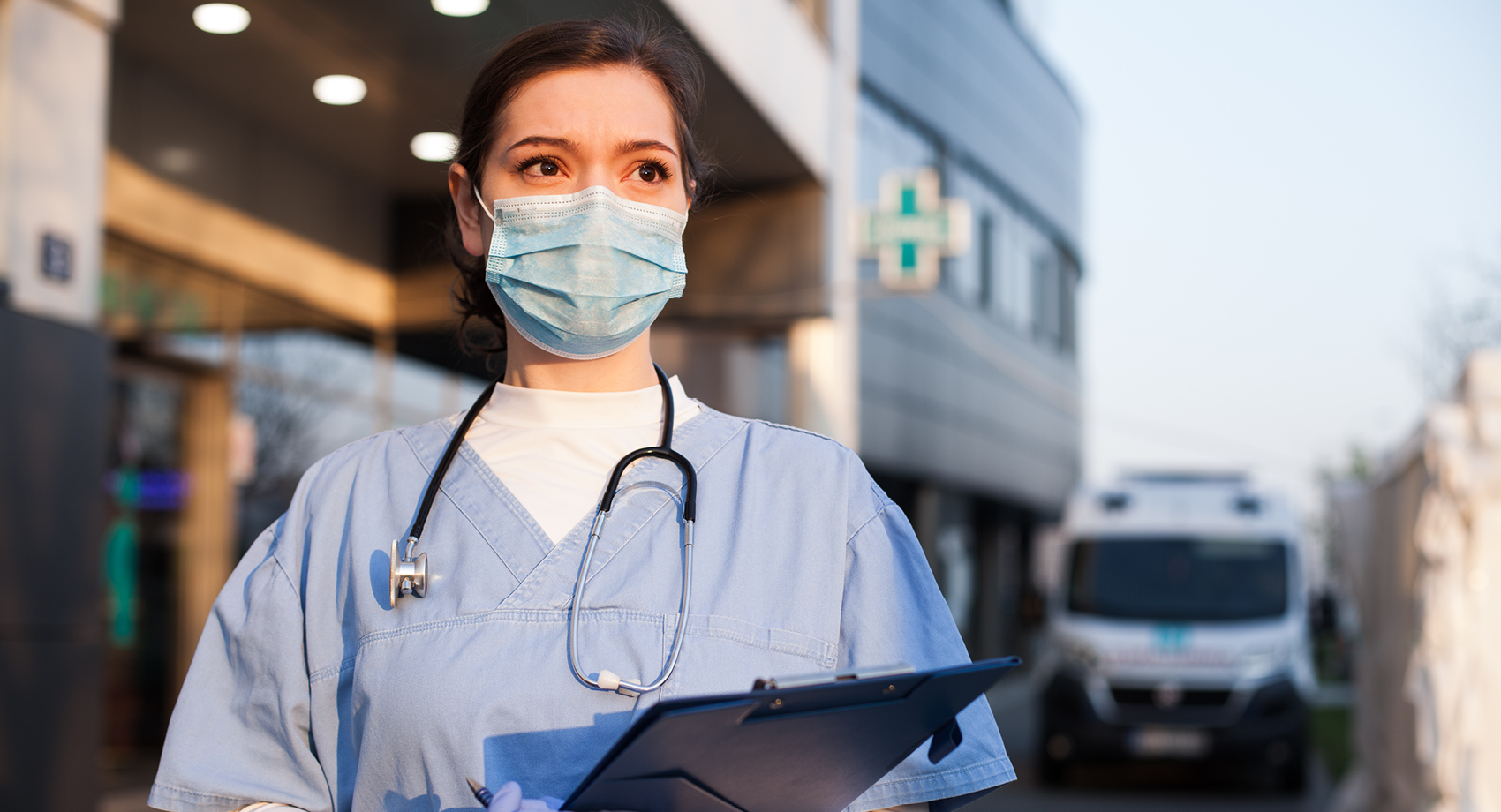 key worker holding clipboard