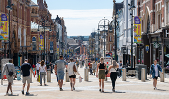 people walking down high street