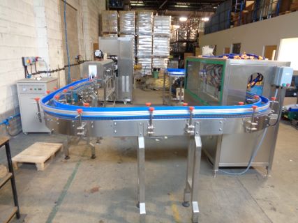 Newlink TB-250 Automatic Bottle Sleeving Machine (2023) and a Pel 5500 Baler