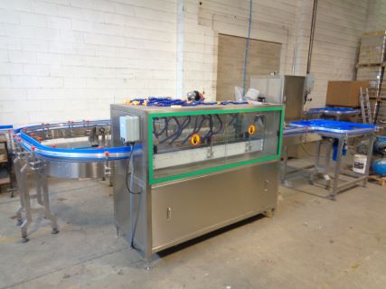 Newlink TB-250 Automatic Bottle Sleeving Machine (2023) and a Pel 5500 Baler